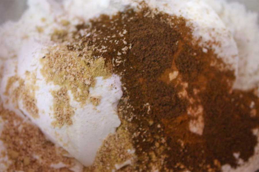 Flour and spices in a bowl.