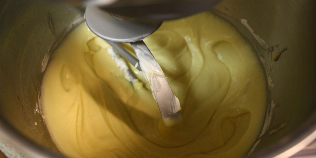 Mom's Sour Cream Pound Cake - Moist, tender inside with a crispy crunchy crust. A classic at it's best! Cake batter in mixing bowl.