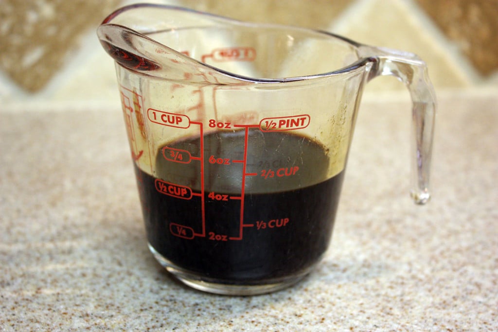 Espresso in a glass measuring cup.