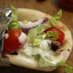 Chicken Gryos - Greek marinated chicken, stuffed in homemade naan, topped with fresh tzatziki sauce! So good!