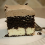 Chocolate italian love cake with a fork on a white plate.