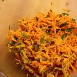 Savory Carrot Salad on a cutting board.