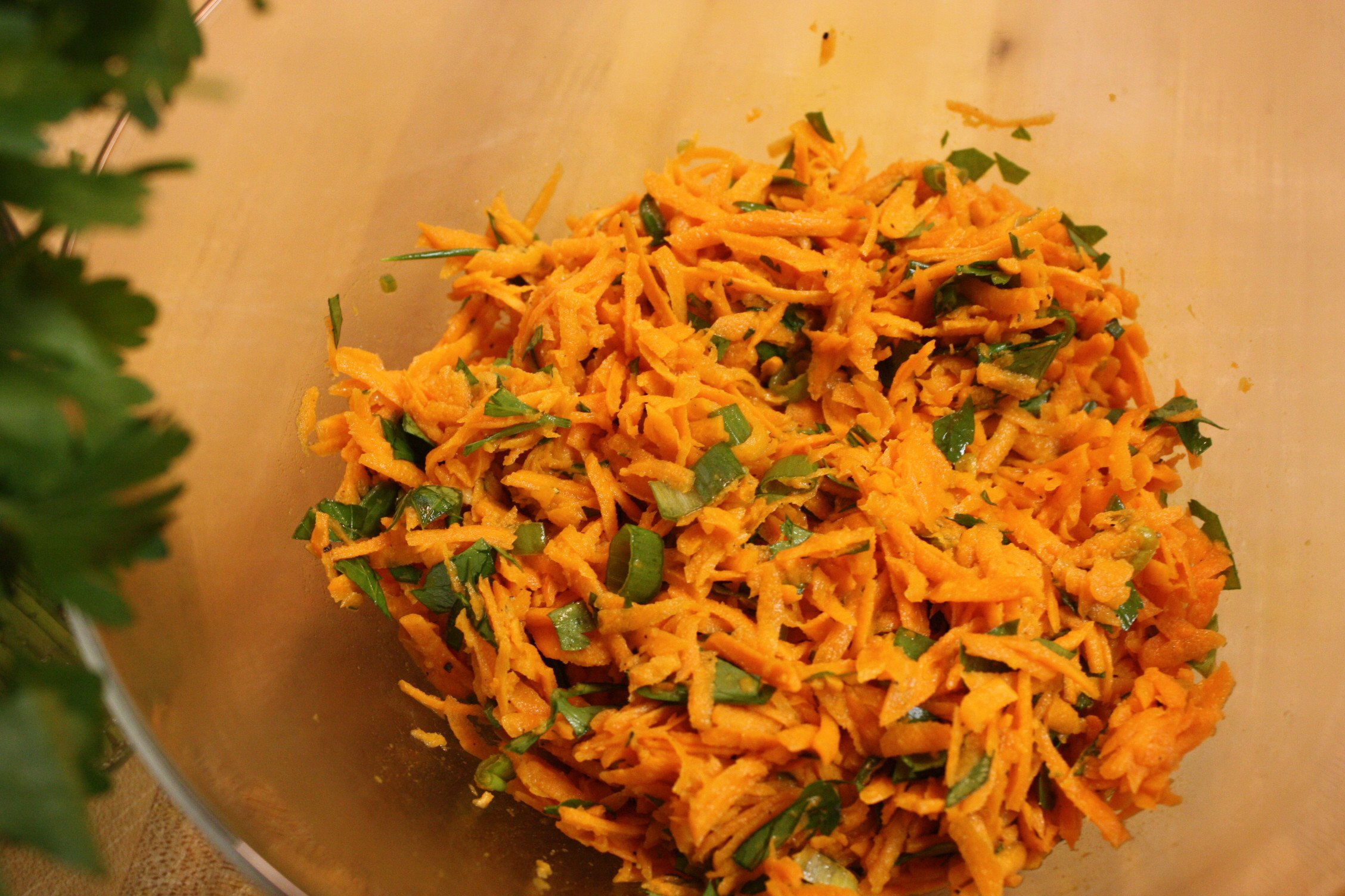 Savory Carrot Salad on a cutting board.