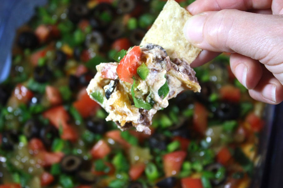 Black Bean Taco Dip on a tortilla strip.