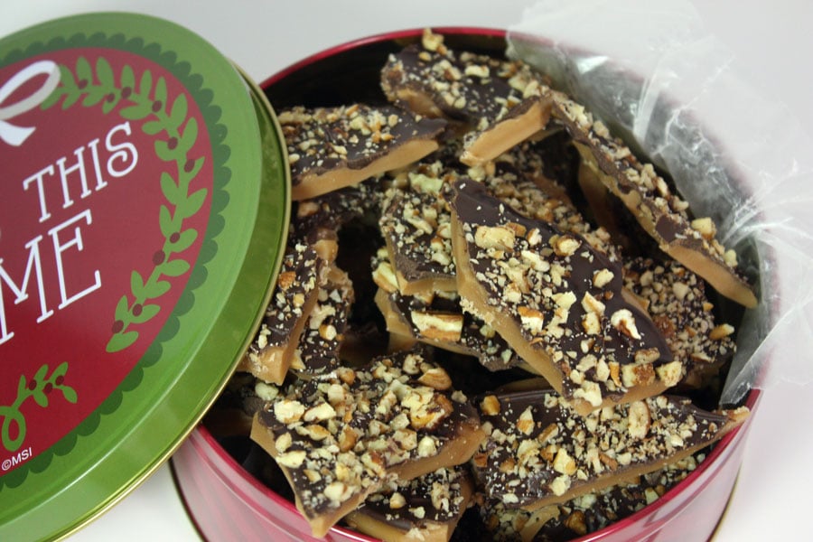 Homemade toffee in a cookie tin.