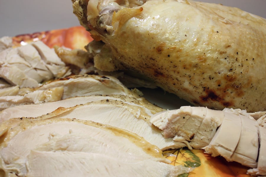 Sliced turkey on a serving platter.