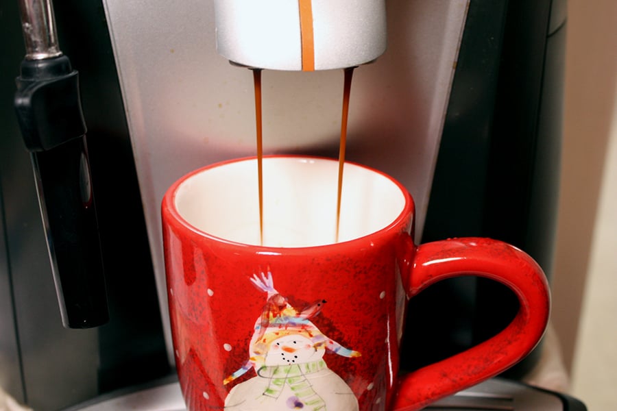 Copycat Holiday Spice Flat White - espresso pulled into a red Christmas mug