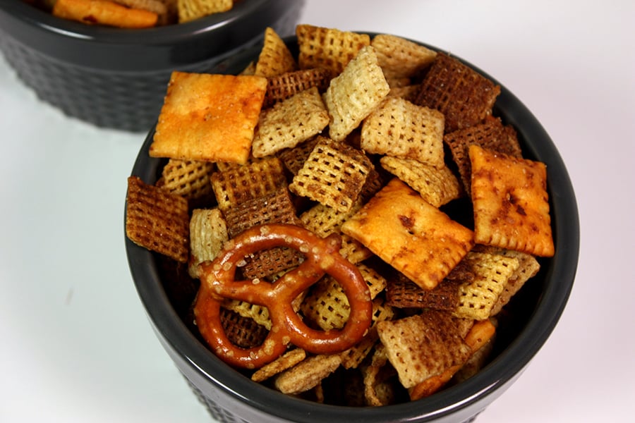 Slow Cooker Chex Mix in a gray ramekin.