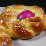 Italian Easter bread on a baking sheet.