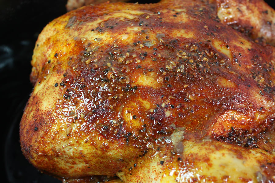 Slow cooker roasted chicken in a crock pot.