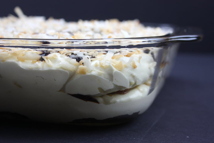 Samoa Cake in a glass baking dish.