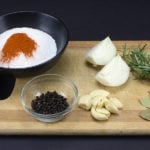 Simple Pork Shoulder Brine ingredients on a cutting board.