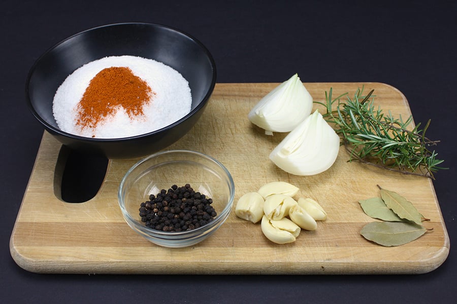 Simple Pork Shoulder Brine ingredients on a cutting board.