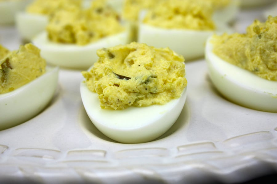 Devilled eggs in a devilled eggs platter.