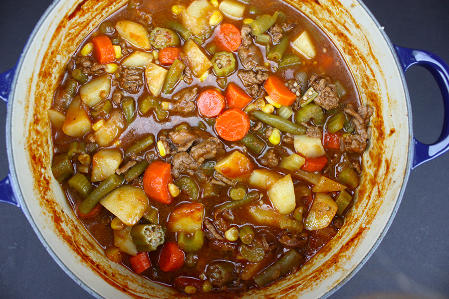 Finished vegetable beef soup in a dutch oven.