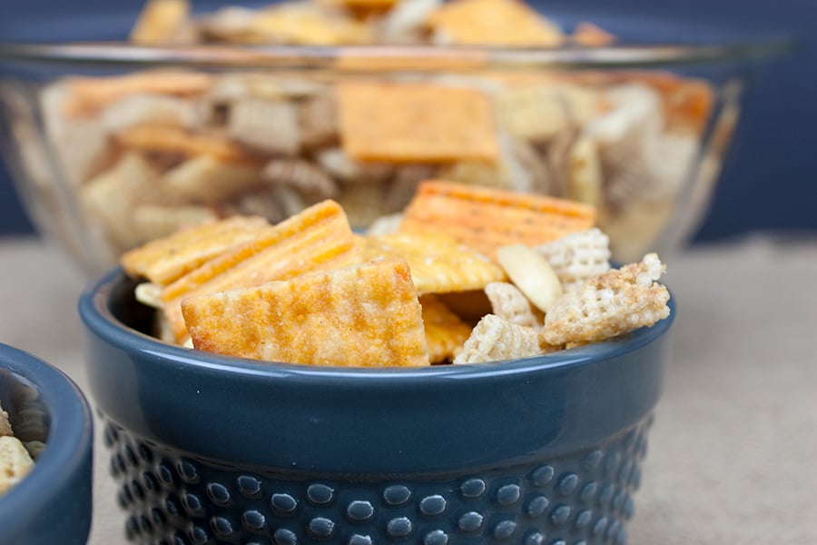 Cheddar snack mix in a blue bowl