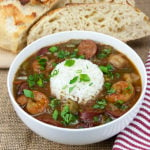 Shrimp and Sausage Gumbo - Our favorite gumbo with rice in a white bowl.