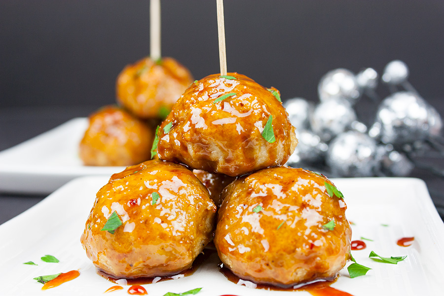 Firecracker Chicken Meatballs - These pack loads of spicy, sticky, slightly sweet flavor in one little morsel!