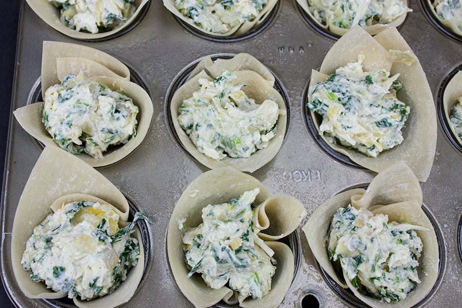 Spinach Artichoke Cups - wontons in a mini muffin pan stuffed with filling