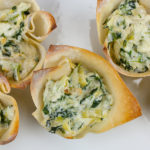 Spinach artichoke cups in baked won ton wrappers.