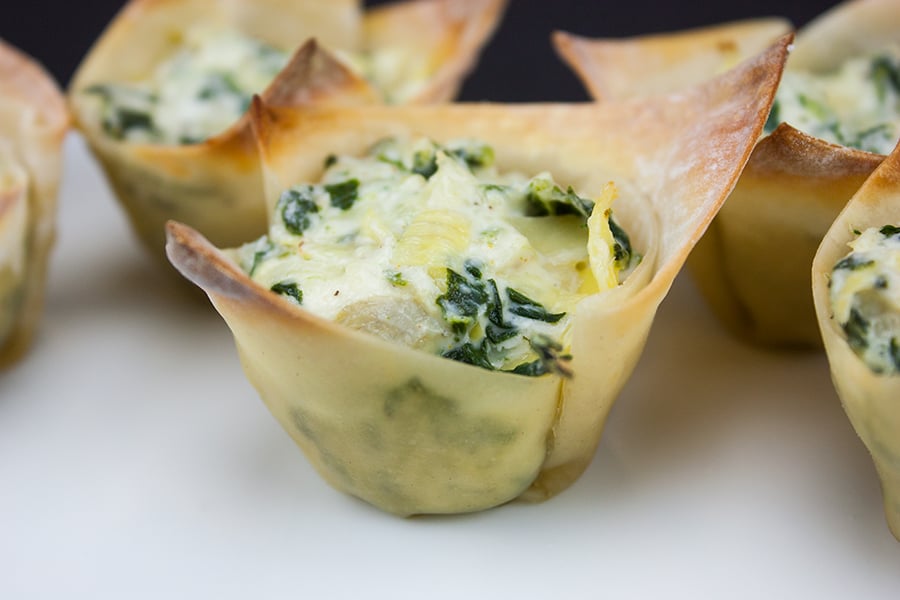 Fast & Easy Spinach Artichoke Cups on a white platter