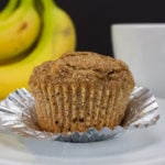 Healthy Whole Wheat Banana Muffin with the cupcake wrapper peeled down.