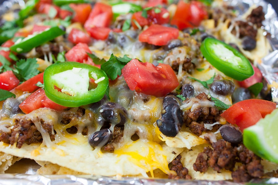 Close up of the nachos in the pan.