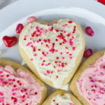 Heart shaped cookies on a white plate.