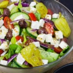 Homemade Greek Salad Dressing served in glass bowl.