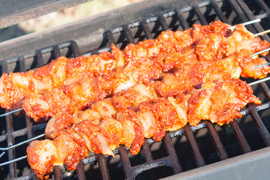 Bacon Paste BBQ Chicken Kebabs on a hot grill