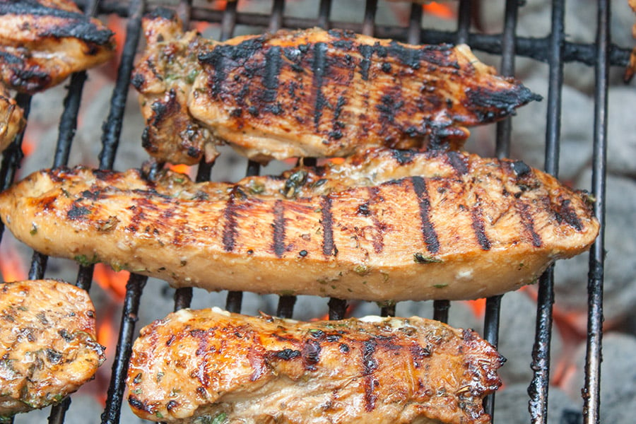 Best Ever Grilled Chicken Marinade - This marinade imparts the ultimate flavor experience and produces a juicy tender piece of grilled chicken. Be sure to add this to your 4th of July menu.