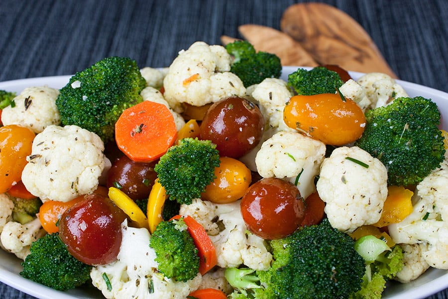 Marinated Fresh Vegetable Salad in an oval white bowl