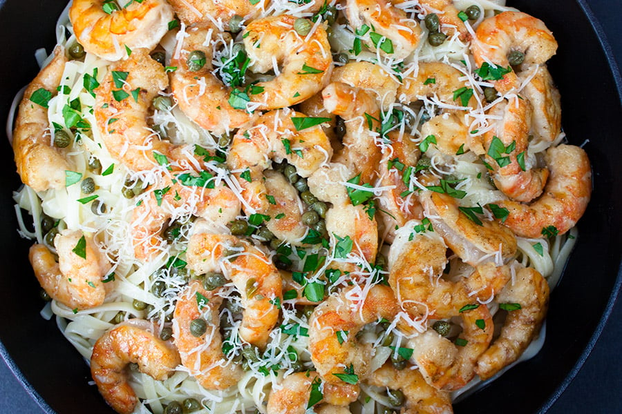 Fast & Easy Shrimp Piccata - It's on the table in under 30 minutes. Shrimp sauteed in a lemon-butter-caper sauce. It's fresh, bursting with flavor and comes together fast.