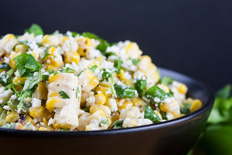 Grilled Mexican Street Corn Salad - A tantalizing combination of sweet, savory, smoky and spicy flavors. Easy to make and even easier to devour!