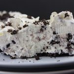 Cookies and Cream Pie - A delicious no bake Oreo cookie crust studded generously with everyone's favorite cookies and cream.