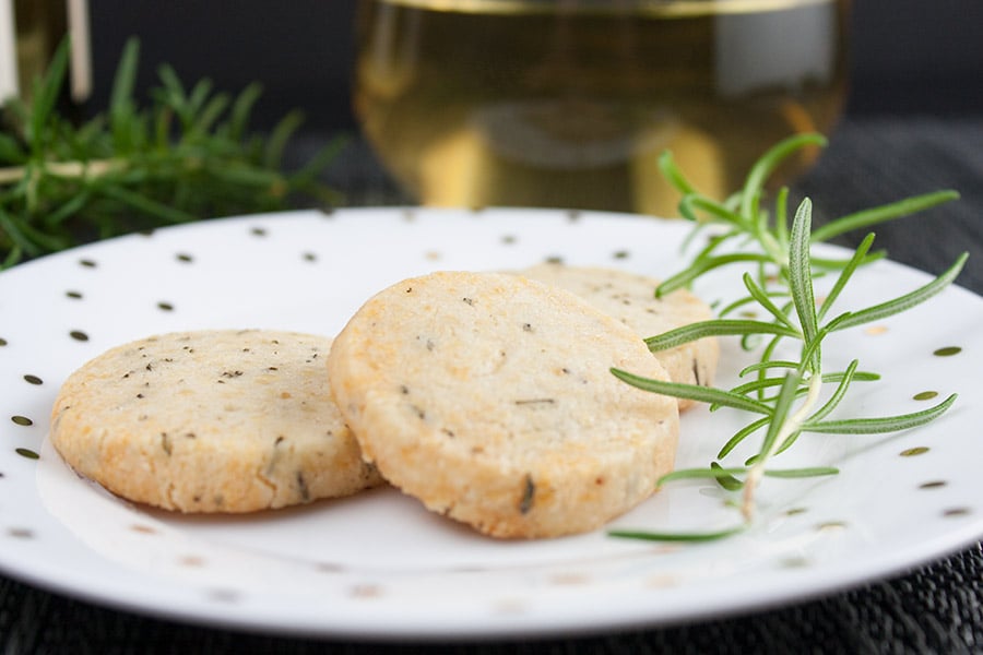 Savory Parmesan Rosemary Shortbread - Fresh rosemary, parmesan cheese and loads of fresh cracked black pepper make this the perfect cocktail appetizer or just a snack.