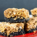 Salted Butterscotch Pretzel Brookies stacked on a red plate.