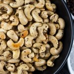 Salt and Pepper Roasted Cashews - Tantalize your taste buds with these savory spice kissed roasted cashews! So simple you will kick yourself for not trying this recipe sooner.