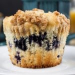 Lemon Streusel Blueberry Muffin on a white plate.