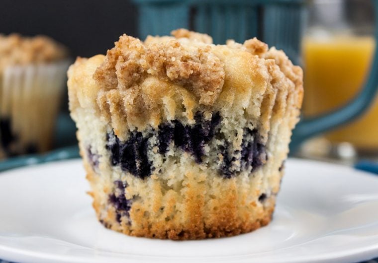 Lemon Streusel Blueberry Muffins - Muffin PERFECTION! A soft, velvety, moist muffin loaded with juicy fresh blueberries and topped with a lightly sweet crumb topping.