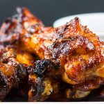 Cajun Smoked Wings - These barbecued wings have a spicy Cajun rub meeting up with some sweet Pecan wood smoke, then finished off with an aromatic hot sauce. They are deliciously smokey and spicy with a slight sticky sweet sauce that brings it all together in the most incredible wing you will ever have.