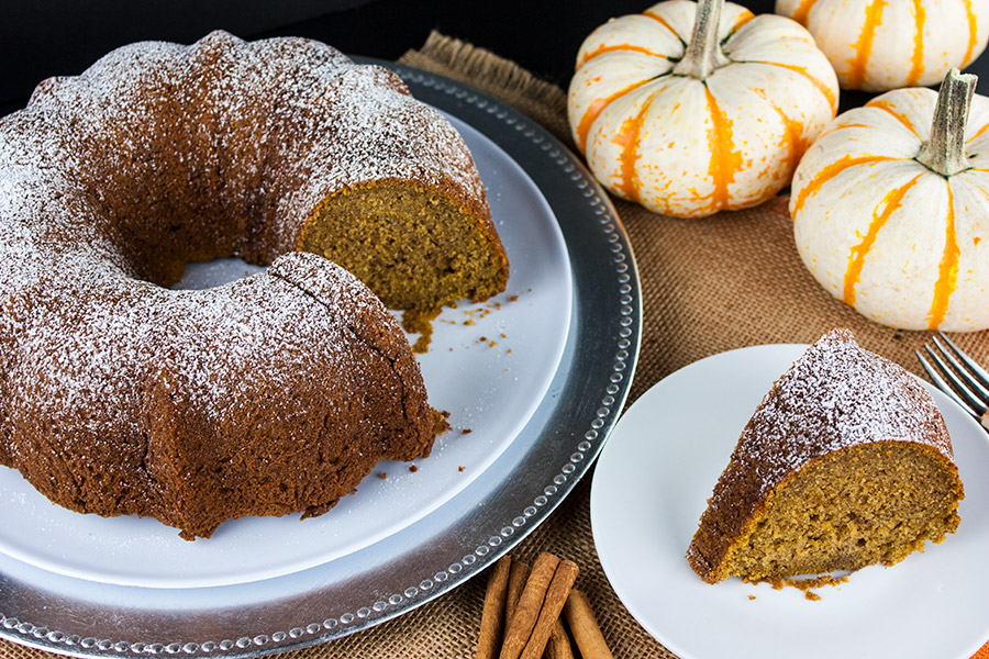 Pumpkin Spice Bundt Cake on a white and silver platter