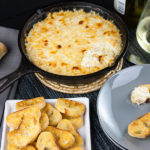 Baked Vidalia Onion Dip - Sweet Vidalia onion baked with creamy, spicy cheese and served warm with toasted bread, crackers or tortilla chips is perfect for all occasions.