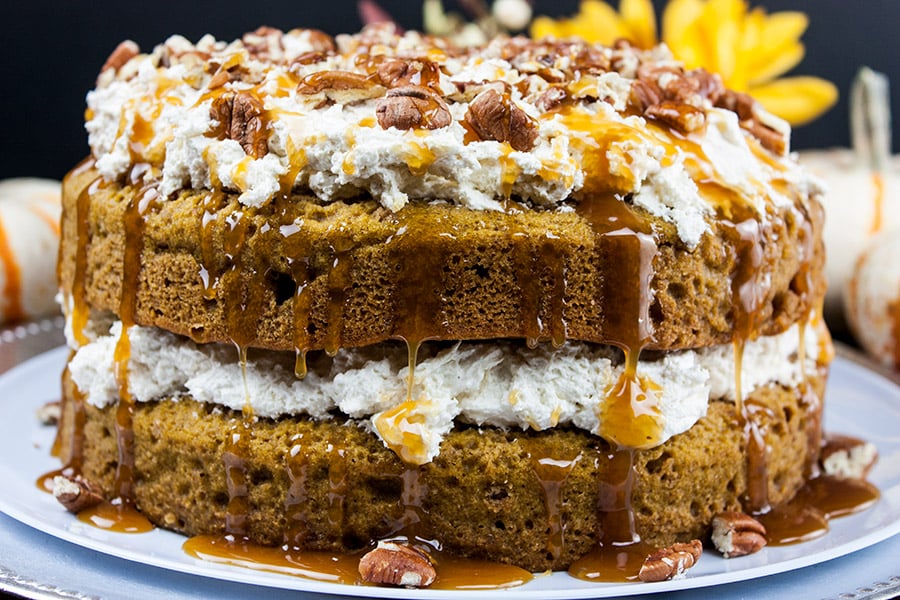 Easy Pumpkin Cake with Cream Cheese Filling on a cake serving plate.
