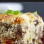 sausage breakfast casserole on red plate