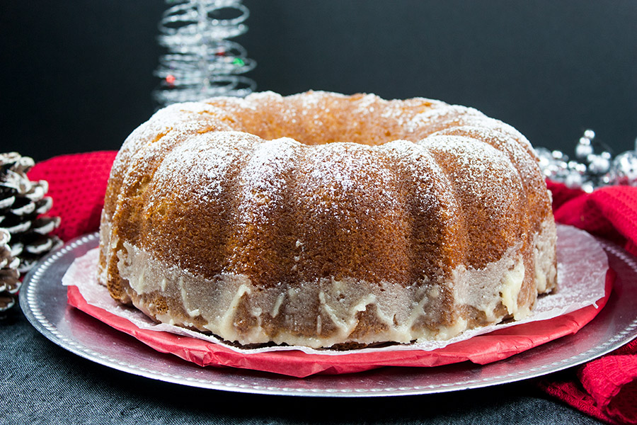 Eggnog Bundt Cake on a silver and red platter.