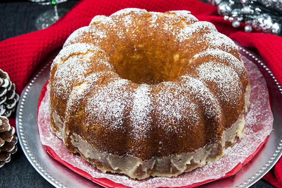 Eggnog Bundt Cake on a silver and red platter.