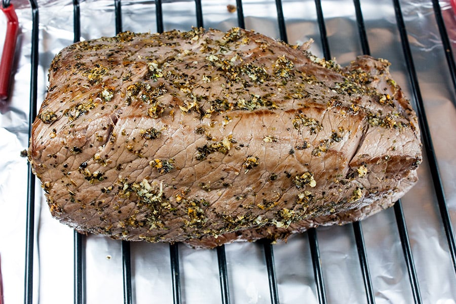 Garlic Herb Beef Top Round Roast - seared roast on rack