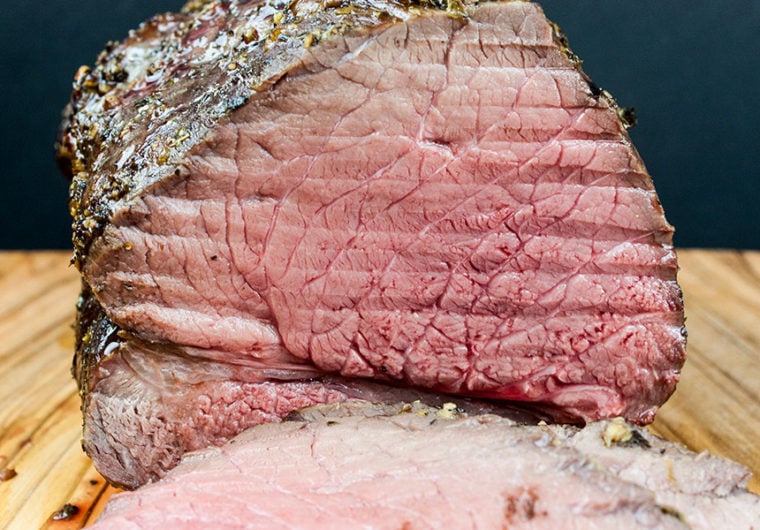 Garlic Herb Beef Top Round Roast - This is the best method of turning an inexpensive piece of meat into a tender, juicy, medium rare delight!
