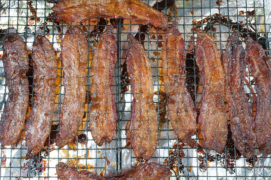 Candied Bacon Jalapeno Poppers - candied bacon on a wire rack